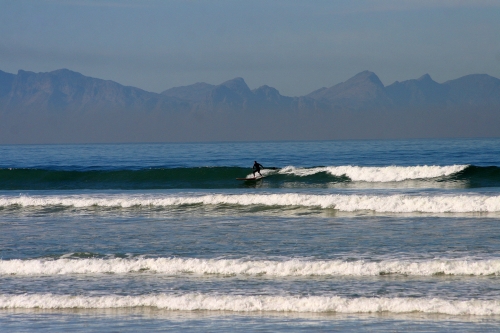 surfers corner waves